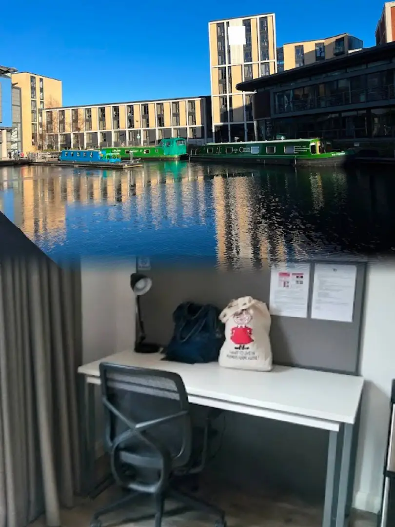 I love sitting on the sofa and watching people come and go on the canal through the floor-to-ceiling windows.