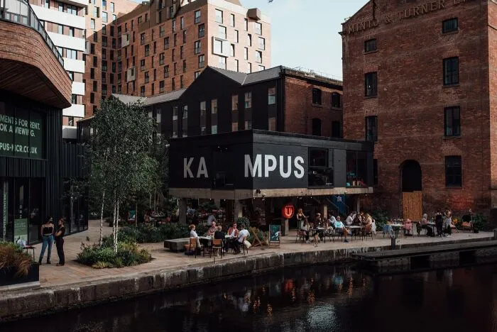 What kind of apartments in Manchester were emptied out in one afternoon by a stampede?