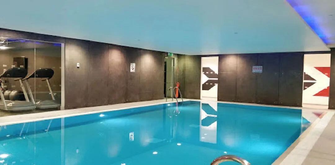 London 23Fall student apartment with a swimming pool.