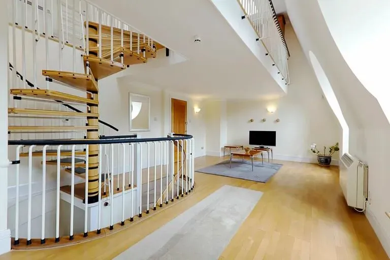 Finally living in a duplex with a spiral staircase, a 2B2B in London.