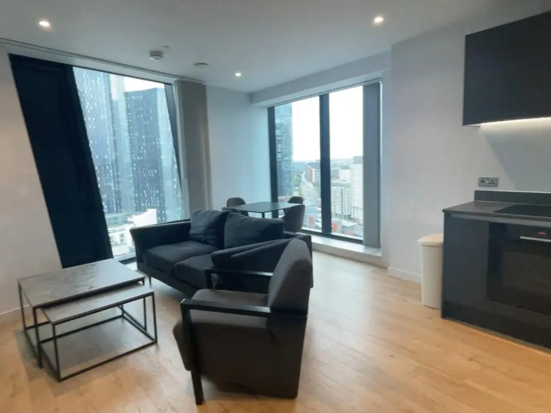 Two-bedroom apartment starting with "2" in Manchester's Tower District. Who's getting lost in this huge floor-to-ceiling window?